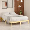 A wooden bed frame with white bedding is shown in a room with artwork on the wall and a plant. Anteprima dell’immagine prodotto