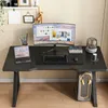 A gaming desk setup with a monitor, laptop, keyboard, and headphones. Náhled obrázku produktu