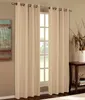 A window with beige curtains and a painting on the wall. Produktbild-Vorschau