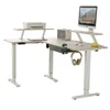 An L-shaped adjustable height desk with office equipment. Voir les images du produit