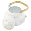 A white enamel teapot with gold marbling and a brass handle, shown with its lid off. Podgląd zdjęcia produktu