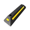A black parking curb with yellow reflective stripes on a white background. Náhled obrázku produktu