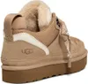 A rear view of a beige UGG bootie. Náhľad obrázku produktu