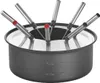 A fondue pot with fondue forks inserted into it. Náhľad obrázku produktu