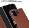 Selencia Genuine Leather Bookcase dla Apple iPhone 16 - Podgląd zdjęcia produktu 4