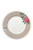 A single plate with a floral design on a white background. Voir les images du produit