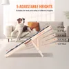 A dog is lying on a sofa next to a wooden ramp designed for pets to access furniture. Produktbild-Vorschau