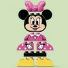 A disassembled LEGO DUPLO Minnie Mouse figure against a light green background. Anteprima dell’immagine prodotto