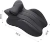 A dark gray wedge-shaped pillow with a headrest, shown from a diagonal angle with dimensions indicated by text. Produktbild-Vorschau