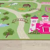 A close-up view of a colorful children's play rug with a castle, bridges, trees, and animals. Anteprima dell’immagine prodotto