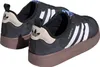 A pair of black Adidas Puffylette sneakers with white stripes and a brown sole. Podgląd zdjęcia produktu