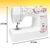 A white sewing machine with red floral accents is shown against a gradient yellow and white background. Dimensions are indicated by lines and text. Podgląd zdjęcia produktu