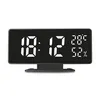 A digital clock displaying the time, temperature, and humidity. Produktbild-Vorschau
