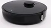 A black robot vacuum cleaner is shown from a slightly elevated side angle against a white background. Náhled obrázku produktu