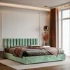 A bedroom scene with a bed and headboard. Anteprima dell’immagine prodotto