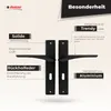 A marketing image showcasing a pair of black door handles with descriptive text highlighting their features. Produktbild-Vorschau