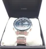 A Casio Edifice watch is displayed inside its dark blue box. Produktbild-Vorschau