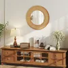 A living room scene featuring a wooden media console with decorative items. Podgląd zdjęcia produktu