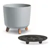 A light gray planter pot with wooden legs and a separate black saucer are shown against a white background. Produktbild-Vorschau