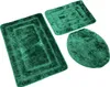 Three green bath mats of different sizes are arranged on a white background. Náhled obrázku produktu