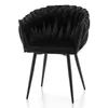 A black velvet chair with a distinctive tufted back and metal legs, shown against a white background. Náhľad obrázku produktu