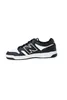 A single black and white New Balance sneaker is shown from the side against a white background. Podgląd zdjęcia produktu