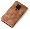 A brown flip cover for a smartphone is shown against a white background. Produktbild-Vorschau