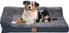 A dog is lying on a dog bed.