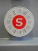 A close-up of a Singer sewing machine stitch selector dial. Anteprima dell’immagine prodotto