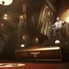 An opulent interior with grand architecture, featuring statues and banners with swastika symbols. Produktbild-Vorschau
