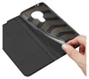 A hand is shown inserting a phone into a black flip case. Produktbild-Vorschau