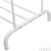 Close-up of the base of a white metal clothing rack. Podgląd zdjęcia produktu