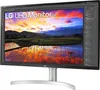 A close-up view of an LG UHD Monitor 4K displaying a vibrant landscape image. Produktbild-Vorschau