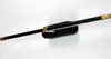 A black and gold LED wand lamp mounted on a white wall. Produktbild-Vorschau