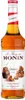 A bottle of Monin Caramel syrup. Produktbild-Vorschau