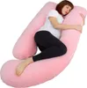 A pregnant woman is sleeping on a large pink U-shaped pillow. Anteprima dell’immagine prodotto