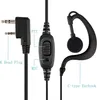 A close-up product shot of a black earpiece with a microphone and a two-pin plug. Produktbild-Vorschau