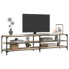 A TV stand with a television and decorative items on a white background. Produktbild-Vorschau