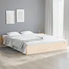 A bedroom scene with a wooden bed frame and white bedding. Produktbild-Vorschau
