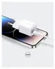 A white Anker charger is plugged into a smartphone. Anteprima dell’immagine prodotto