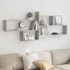 A gray wooden wall shelf with various decorative items and books. Náhľad obrázku produktu