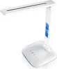 A white LED desk lamp with a digital display is shown against a white background. Anteprima dell’immagine prodotto