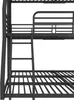 A close-up side view of a black metal bunk bed frame, showing the ladder and the slats of the lower bunk. Podgląd zdjęcia produktu