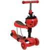 A red 3-in-1 scooter for children, designed with a ladybug theme. Náhľad obrázku produktu