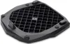 A black plastic adapter plate with a grid pattern on top and four rubber feet on the bottom, shown from a diagonal top-down view. Podgląd zdjęcia produktu