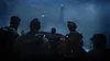 A group of soldiers in tactical gear on a boat, looking out at a stormy sea towards a large industrial structure. Produktbild-Vorschau