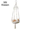 A macrame hanging cat hammock with a small animal inside. Produktbild-Vorschau