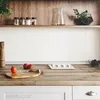 A kitchen counter with a wooden surface, showing a spice rack on a shelf above, and some tomatoes and a knife on the counter. Produktbild-Vorschau