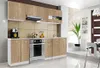 A modern kitchen setup with wooden cabinets, stainless steel appliances, and a window with blinds.