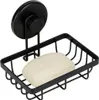 A black metal soap dish with a suction cup mount and a bar of soap inside, shown against a white background. Anteprima dell’immagine prodotto